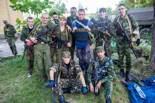 Russian mercenary Gritsyuk with his fellow terrorists and Russian press
