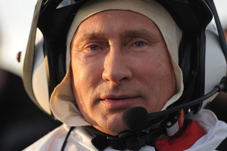 Putin lives in an alternative universe and expects everyone to join him there