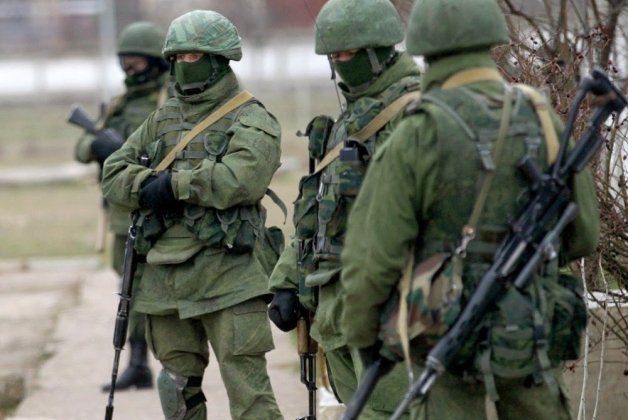 Russia's "little green men" special forces annexing Ukrainian peninsula of Crimea. February 2014