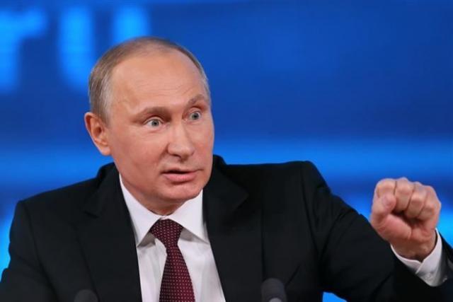 Putin accuses Ukraine of backing wartime group, attacking Russian churches on Defender Day