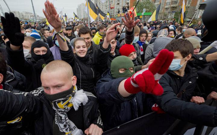 Fascist salutes at the large, Putin government-authorized Russian March in Moscow, Russia