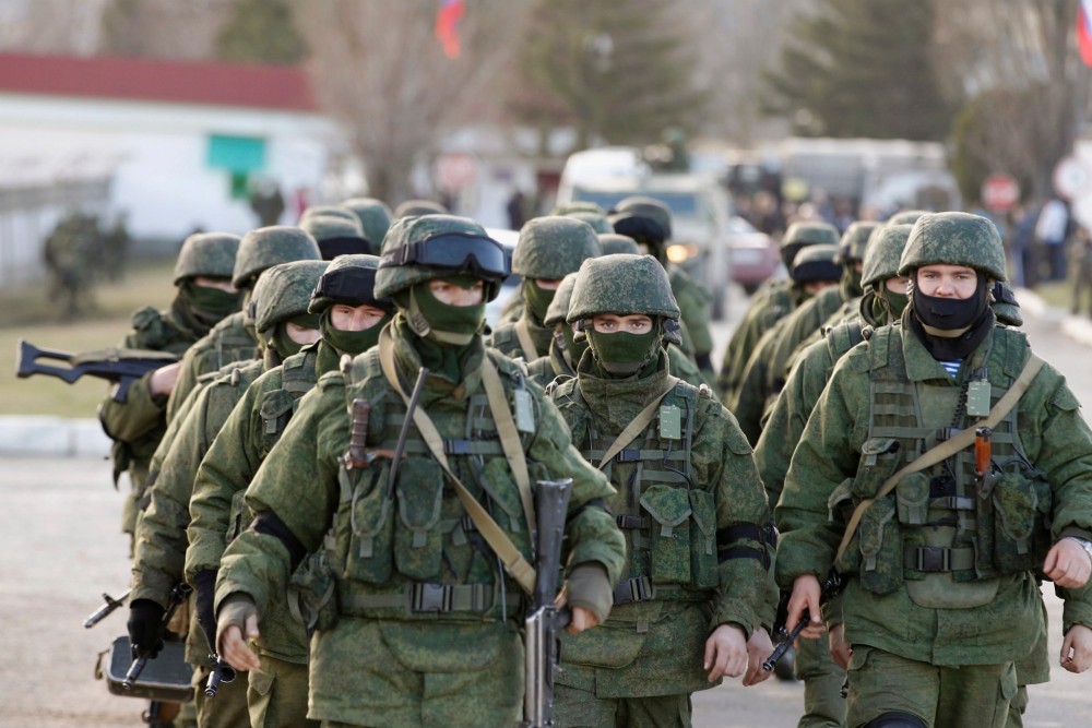 In a hybrid war operation, Russian "little green men", heavily armed soldiers without insignia, annexed Crimea from Ukraine
