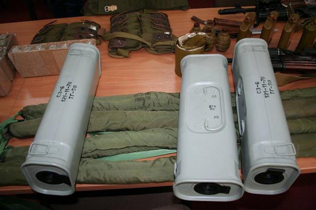 Weapons and explosives seized from the members of the arrested terrorist and spy group operating in Kharkiv, which was recruited and controlled by Russian military intelligence. (Image: SBU)