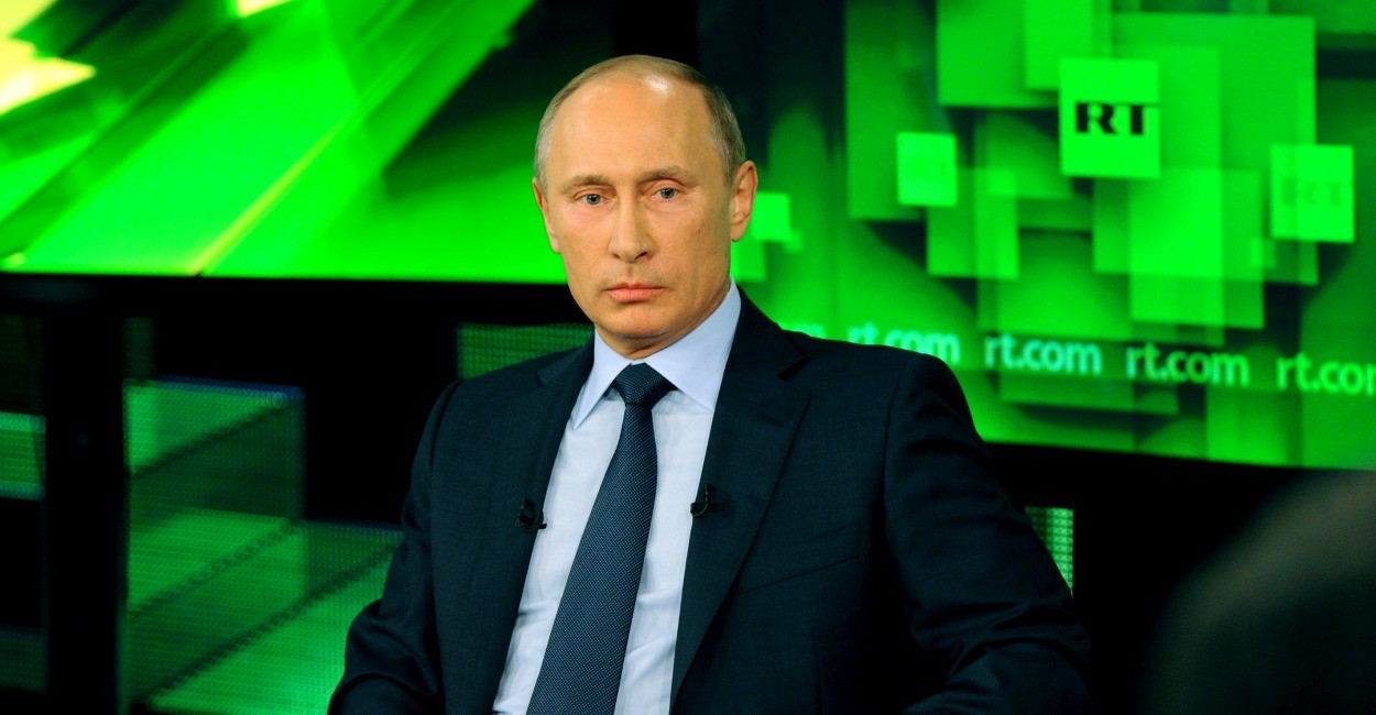 Vladimir Putin giving an interview to Russian propaganda TV channel RT, formerly known as "Russia Today" (Image: screen capture)