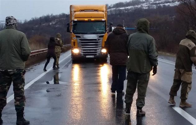 Ukrainian activists launch blockade of Russian trucks, following Poland and Turkey