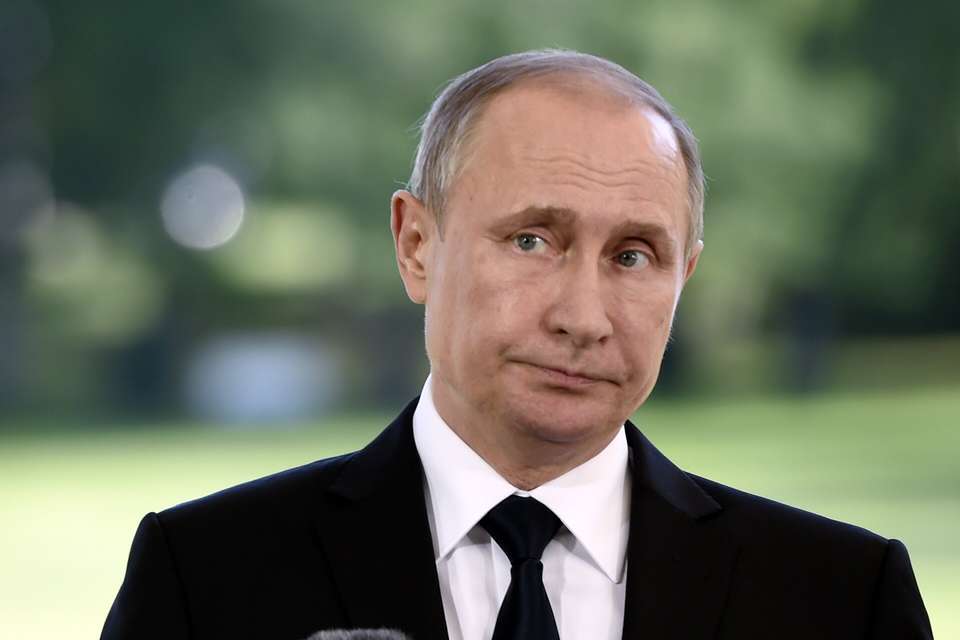 Russia's President Vladimir Putin reacts during a press conference in Finland, Friday, July 1, 2016. ( Jussi Nukari/ Lehtikuva via AP)