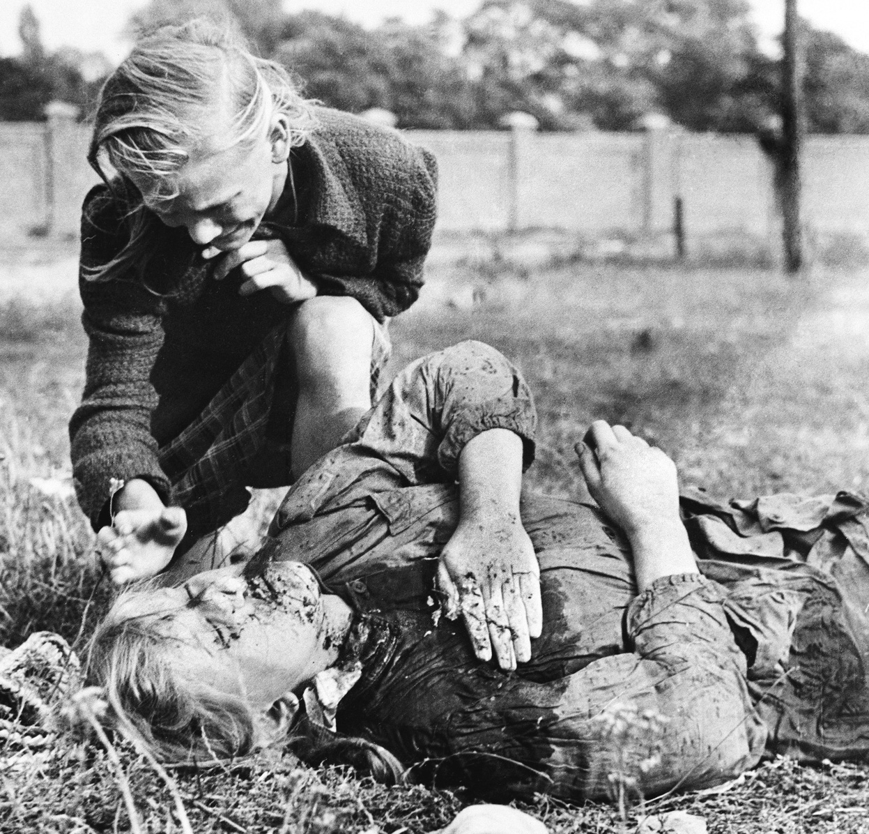 10-year old Kazimiera Mika crying for her sister killed by gun fire from a German plane near Warsaw, Sept. 1939 (Image: Julien Bryan)