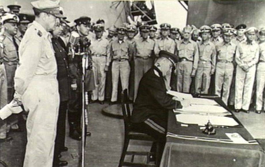 The surrender of the Japanese Empire in WWII aboard USS Missouri in Tokyo Bay, Japan on September 2, 1945. Lieutenant-General Kuzma Derevyanko representing the Soviet Union signs the instrument of surrender. In 2007, Derevyanko was awarded the title of Hero of Ukraine. Now the Russian Federation named one of the Kuril islands in honor of this famous Ukrainian. (Image: Australian War Memorial)