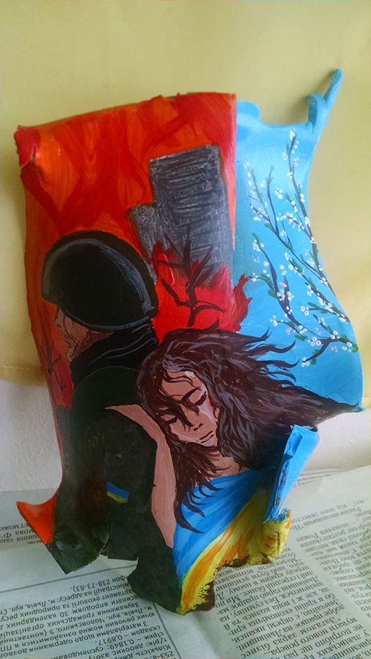 Donbas war refugee turns shrapnel into works of art to raise funds for Ukrainian army ~~