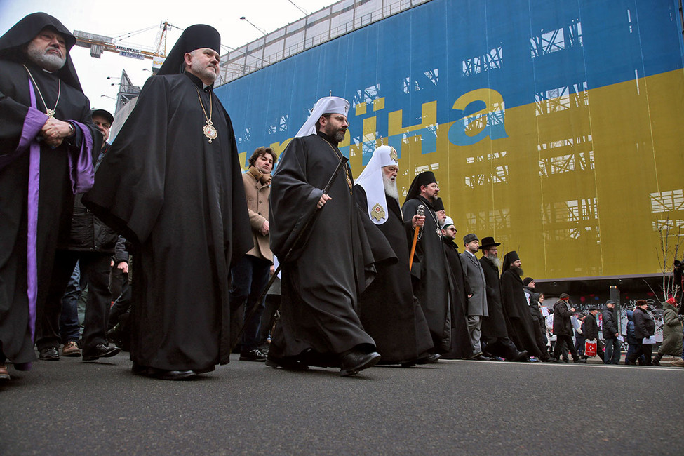 Patriarch of Kyiv and All Rus’-Ukraine Filaret (forth from left) marching among leaders of Ukraine's other religious denominations. Filaret has been the head of the Ukrainian Orthodox Church of the Kyivan Patriarchate since 1995. Until 1992 he was a Metropolitan bishop of the Russian Orthodox Church. Moscow Patriarchate excommunicated him in 1997. (Image: Ivan Kovalenko / Kommersant)