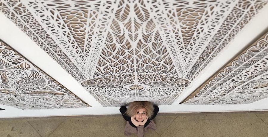 Ukrainian artist takes folk tradition of paper cutting to monumental levels