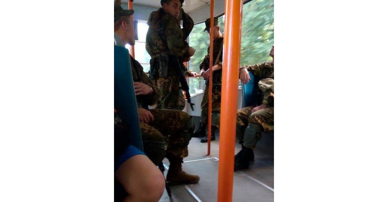 Russian "little green men" armed with the latest version of Kalashnikov assault rifles riding in public transportation in Vitebsk, Belarus. July 2017. Similar Russian special forces soldiers in unmarked uniforms were used by Putin to conduct the operation to annex the Crimean peninsula from Ukraine in February-March 2014. (Image: Drug Syabar)