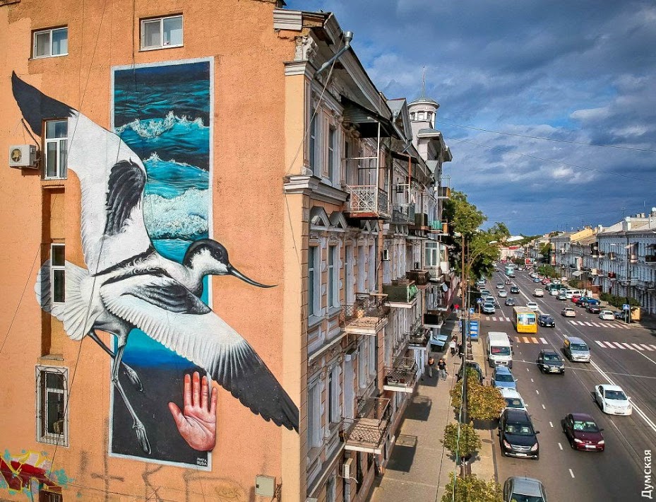 Wildlife murals appear on the streets of Odesa