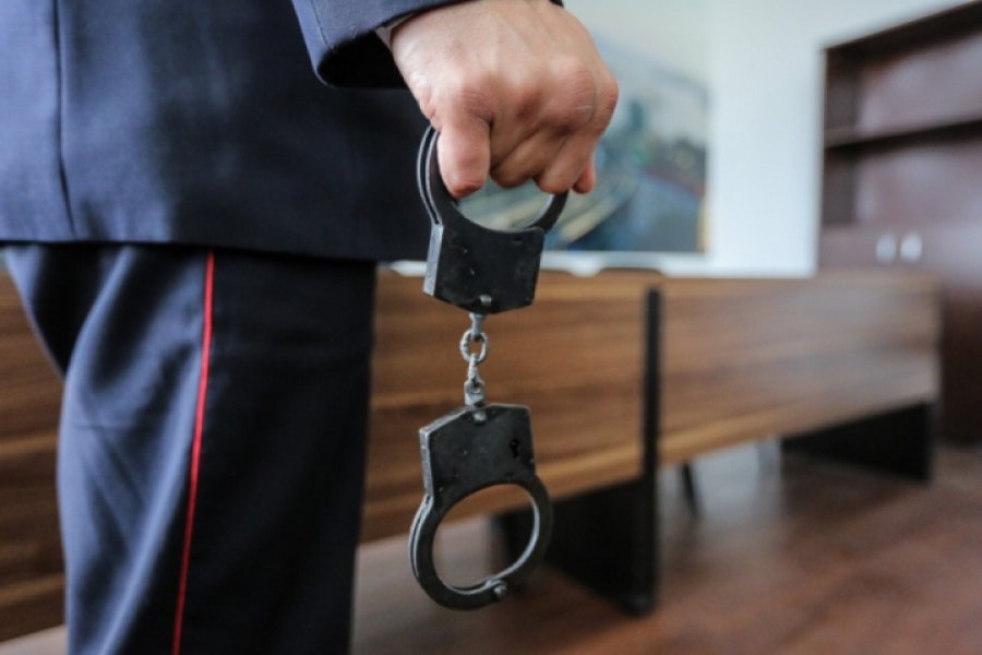 Russian policeman with handcuffs