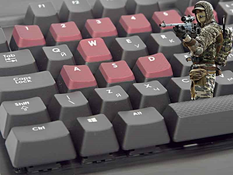 Hybrid war (computer keyboard and Russian soldier)