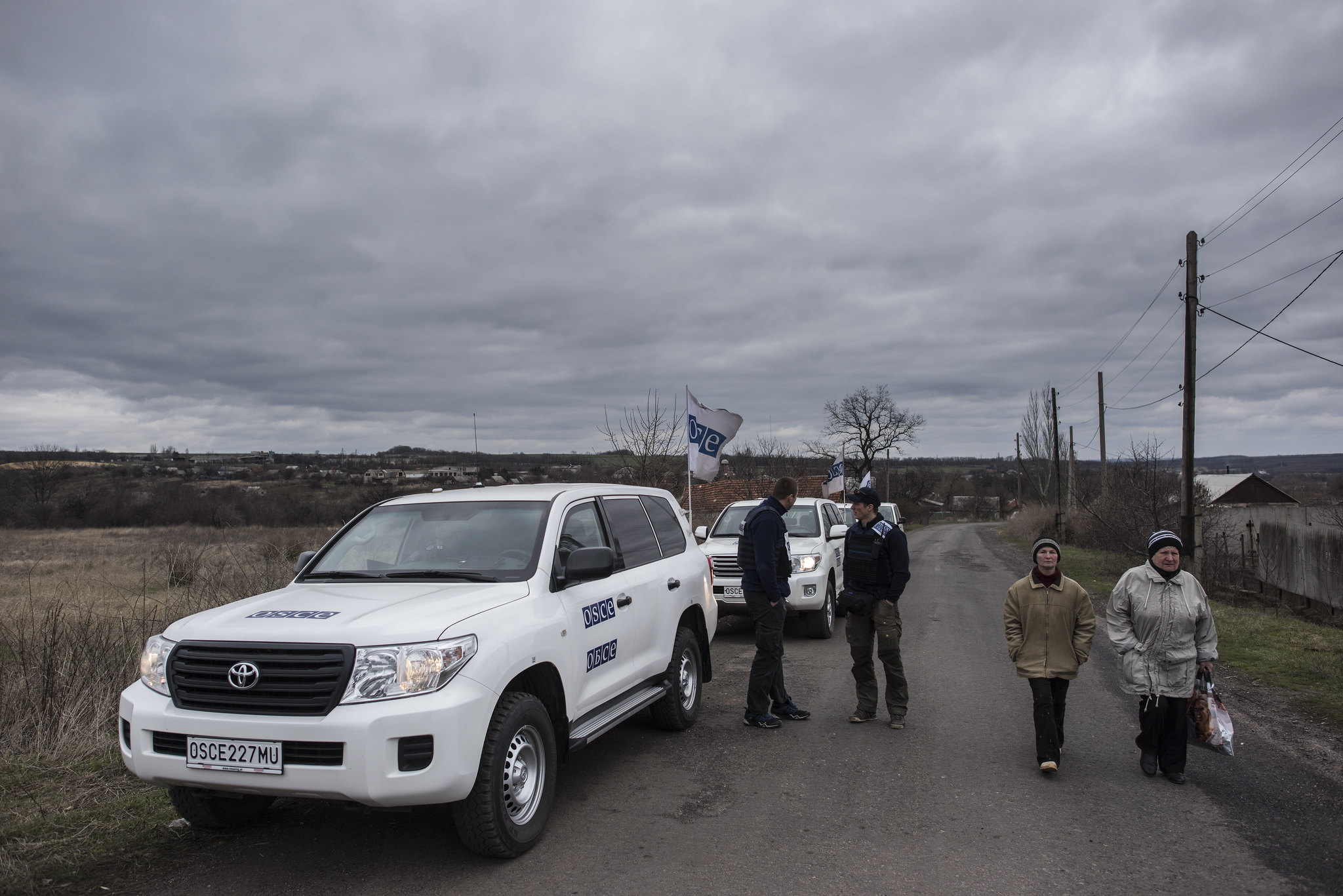 Russian hybrid forces block OSCE monitors inside base, demanding Ukraine release their spy