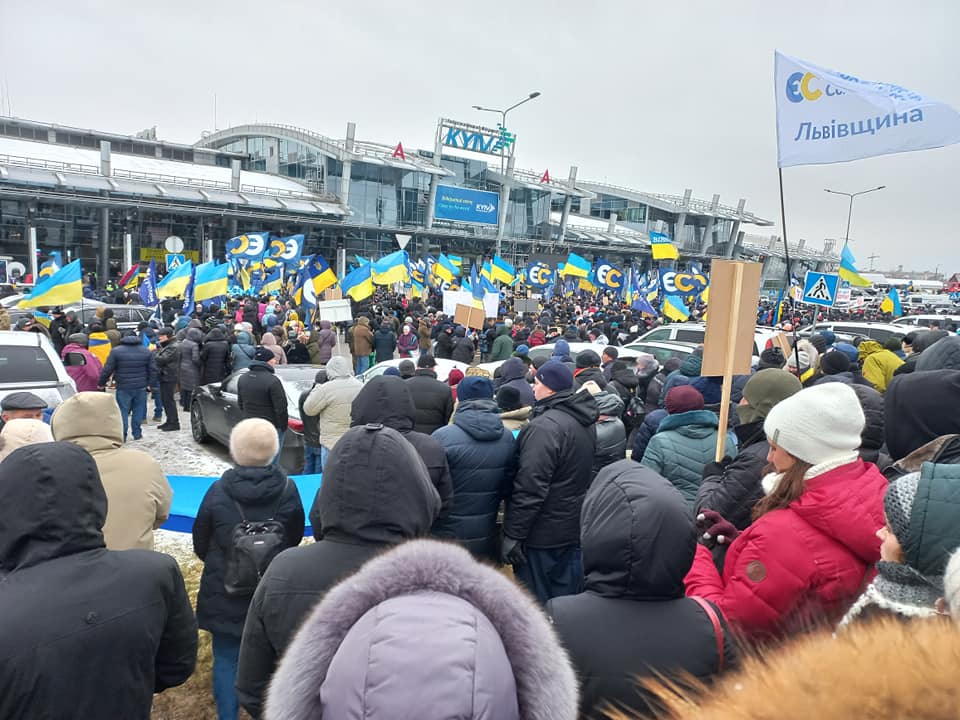 Petro Poroshenko's supporters near the airport, waiting for his return to Ukraine.