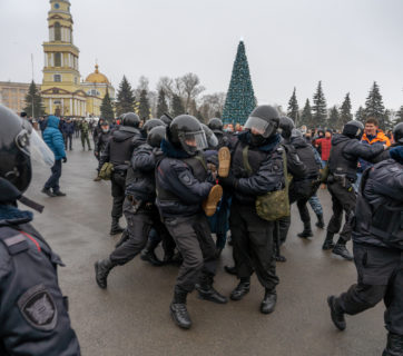 January 23, 2021, Russia, Lipetsk, Rally in support of Alexei Navalny. A man with a poster that says "You can't hide the truth" is harshly detained by the police. Credit: depositphotos