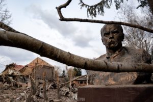 A monument to Ukrainian poet, writer, artist, public and political figure Taras Shevchenko (1814-1861) among ruins and debris in a Ukrainian town bombarded by Russian military. The Russo-Ukrainian War (2014-present). March 2022 (Photo: Maks Levin)