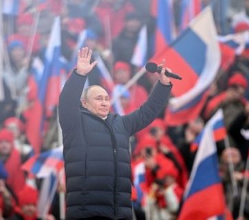 Russian President Vladimir Putin speaks at a propaganda concert dedicated to the 8th anniversary of the occupation of Crimea and current war against Ukraine at the Luzhniki stadium in Moscow. 18 March 2022. Credit: ria.ru