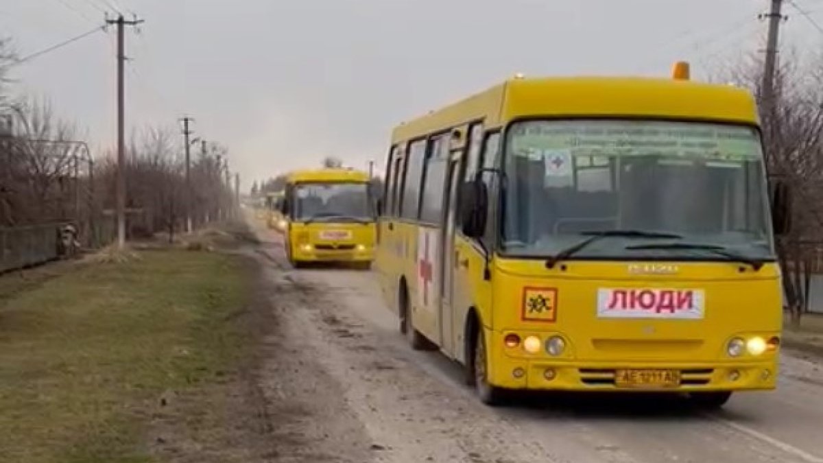 Buses marked “People” for evacuation of civilians from Mariupol in the failed attempt to reach the besieged city on 8 March 2022. Source ~