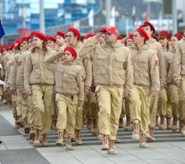 Local troops of Putin’s Youth Army on parade in the city of Sochi, 2017. This analog to Nazi Germany's Hitler Youth and its female equivalent, the League of German Girls, was founded by the Russian Defense Ministry in 2016. It takes Russian children from 8 to 18 years old, indoctrinates with Putinist ideology and teaches them military weapons and tactics. Photo: privetsochi.ru