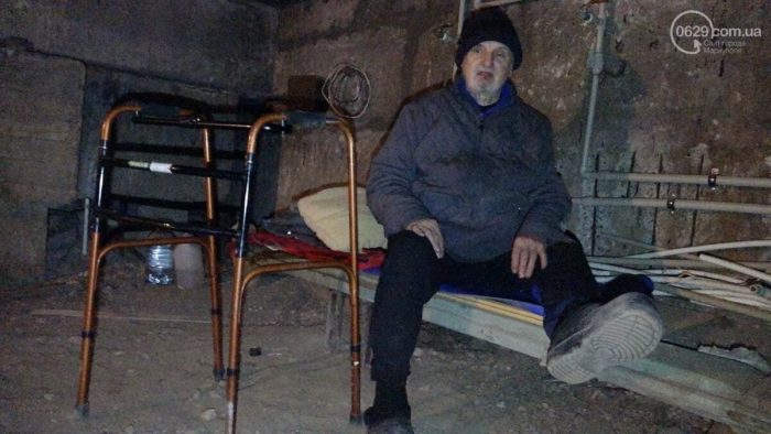Man in a Mariupol bomb shelter. Photo by Mariupol journalist Nadiia Sukhorukova. Source ~