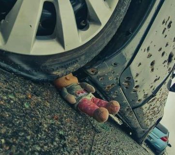 A car of refugees riddled with gun fire by Russian troops. Bucha, Ukraine, April 3, 2022. Russo-Ukrainian War. Source: Dattalion