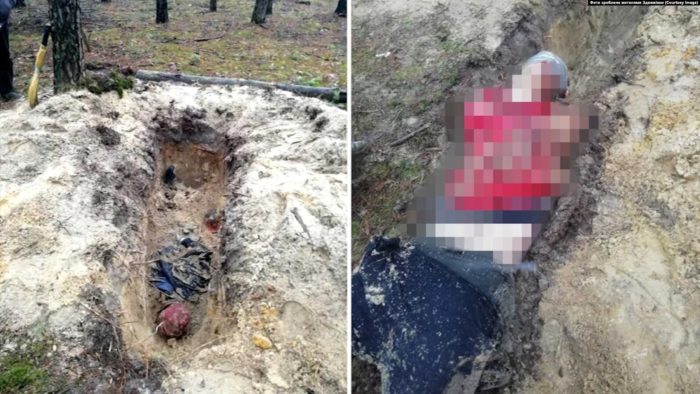 Russian war crimes. Mutilated bodies of Ukrainian soldiers found in trench in Kyiv Oblast