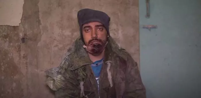 Forced conscript Ruslan Khalilov from occupied Snizhne, Donetsk Oblast in Ukrainian captivity. Source. ~