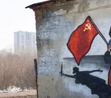 Russian propaganda invasion Ukraine grandma with a flag