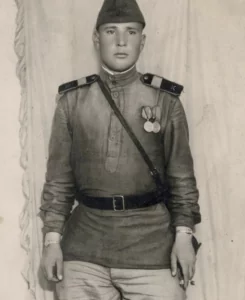 A Red Army soldier wearing German-made women’s watches on each hand. Photo: open source ~