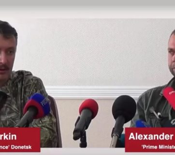 Russian nationals Igor Girkin (aka "Strelkov") as "DNR defense minister" and Alexandr Borodai as "DNR prime minister" in summer 2014 during the initial invasion of Ukraine. Screenshot and captions by ukranews.com