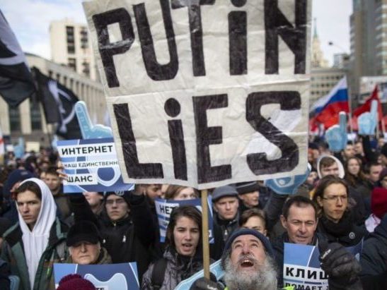 Putin lies. Crowd of protesters against Putin regime