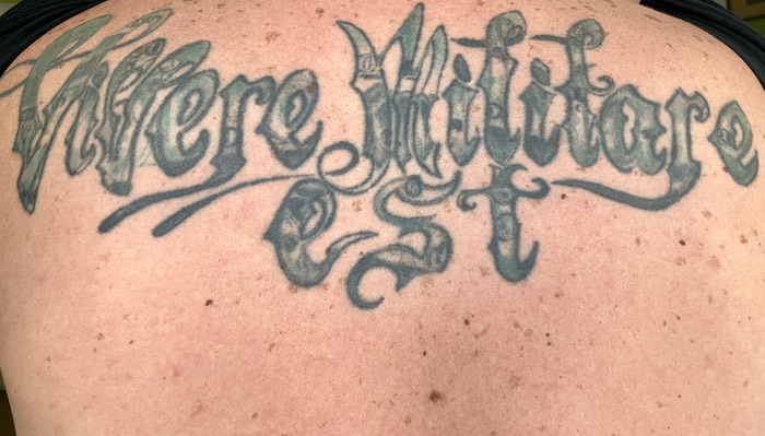 Vitaly’s Tattoo: an altered quote from Stoic philosopher Seneca. “Vivere militare est.” (The full quote is “Atqui vivere, Lucili, militare est” which is Latin for “And yet life, Lucilius, is really a battle.”) ~