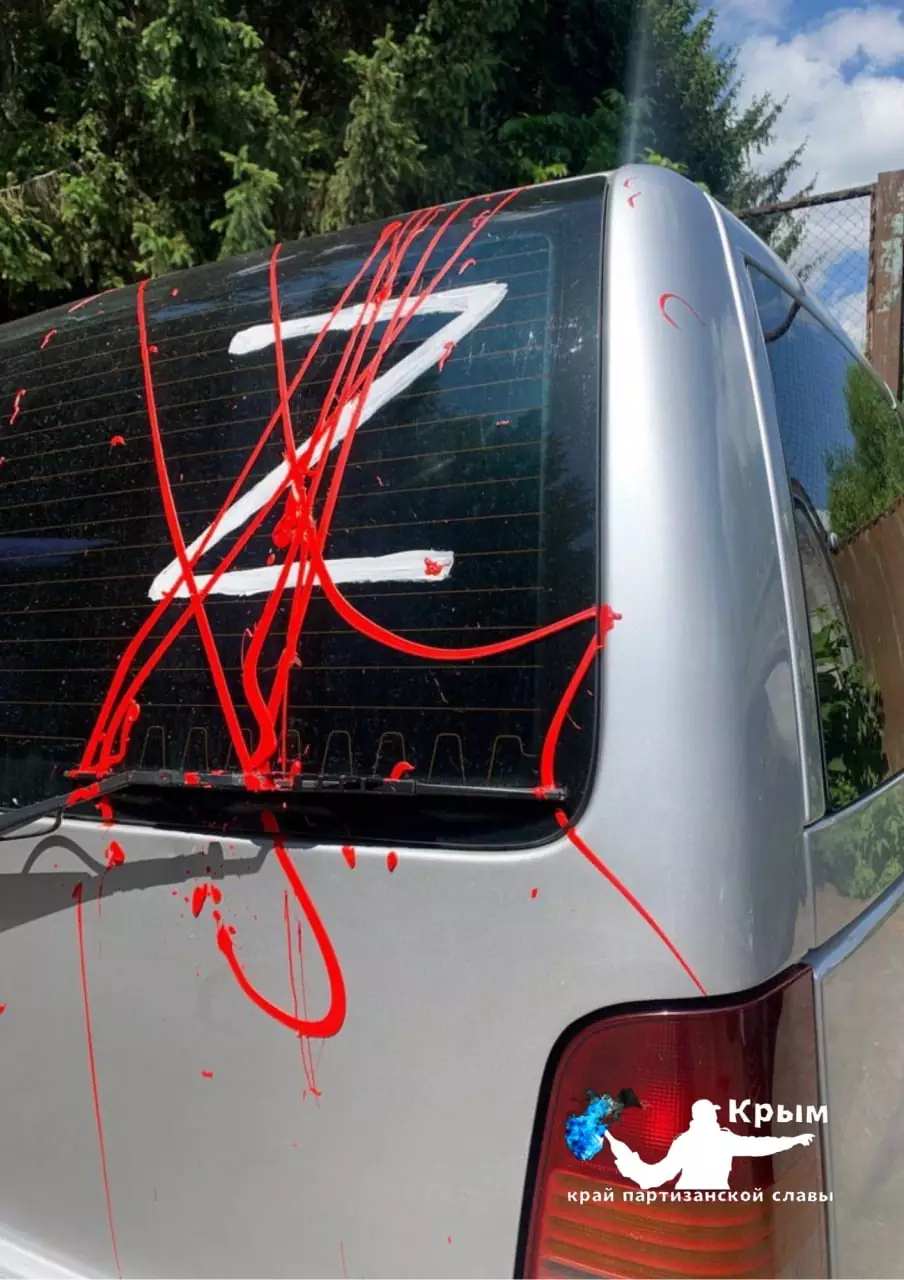 A car with Z painted over by Crimean partisans. 