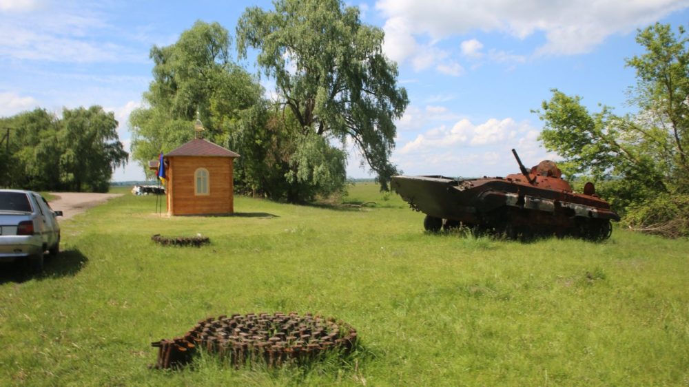 Burnt out tank left on the side of the road in Chernihiv