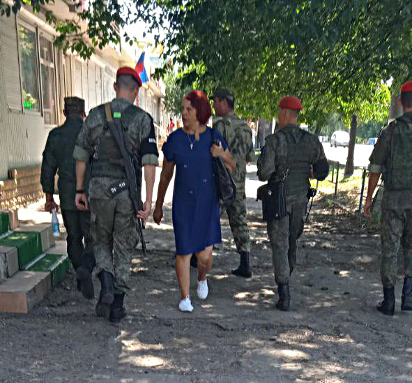 Russian military patrol in occupied Luhansk’s Kamianobridskyi district searching for draftable men on the streets. 7 August 2022. Source. ~