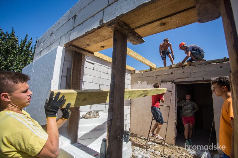 City hipsters repair villages destroyed by Russian occupiers for fun