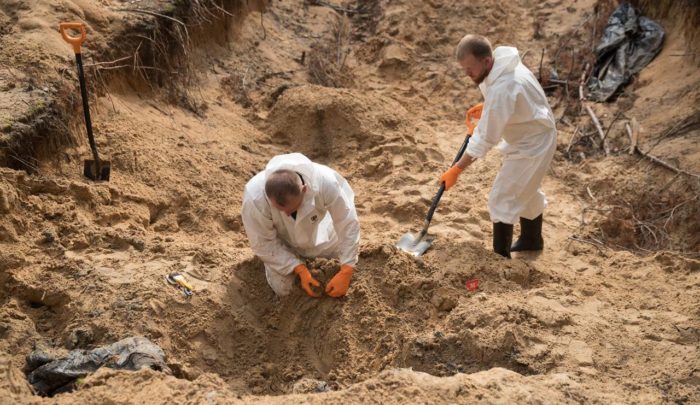 Most bodies exhumed in Ukraine’s deoccupied Izium show signs of violent death – official