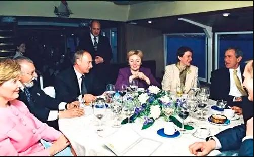 Vladimir and Lyudmila Putin having dinner with George and Laura Bush aboard New Island on May 25, 2002. Behind Lyudmila and Vladimir – Evgeny Prigozhin | Photo: Press Service of the President of Russia ~