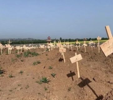 mariupol unmarked graves cemetery russian invasion