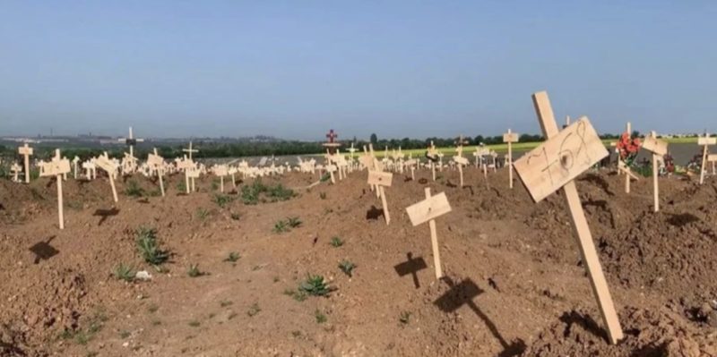 mariupol unmarked graves cemetery russian invasion