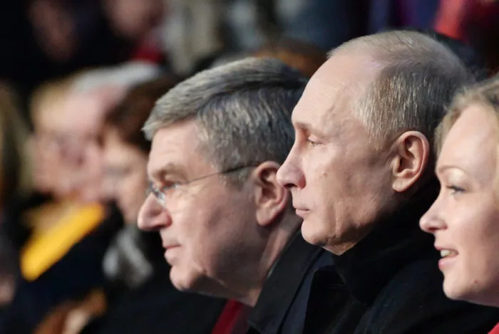 Olympic Committee President Thomas Bach (left) and Russian President Putin at the opening of the Sochi Olympic Games, which preceded Russia’s occupation of Crimea in 2014. Photo: RIA Novosti ~