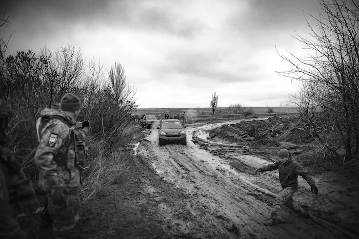 Our team’s vehicle was trapped in the thick mud while visiting the artillery positions around Bakhmut. Photo: Paul Conroy ~