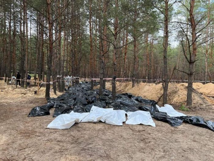 exhumation mass grave bodies izyum kharkiv oblast