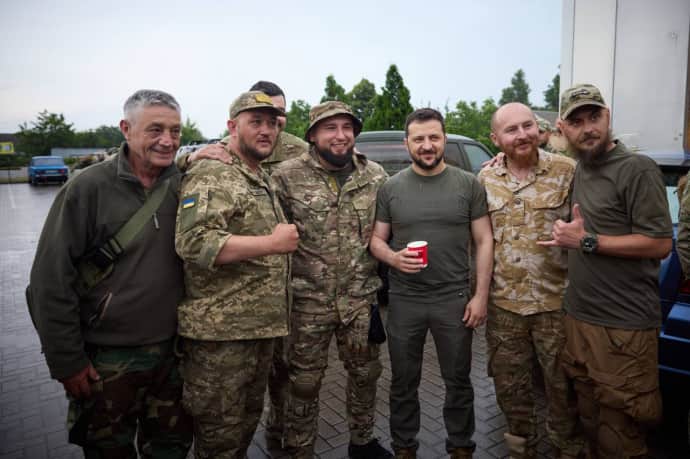 Zelenskyy and Ukrainian soldiers